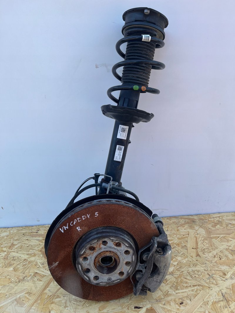 VW CADDY V 2K7 ZWROTNICA AMORTYZATOR MCPHERSON PRAWY PRZÓD 5R3413031J