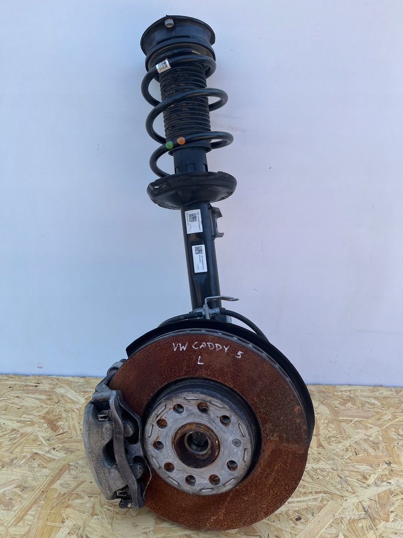 VW CADDY V 2K7 ZWROTNICA AMORTYZATOR MCPHERSON LEWY PRZÓD 5R3413031J