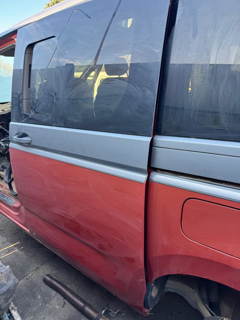 VW MULTIVAN T7 7t0 drzwi tylne przesuwne LEWE LEWY tył