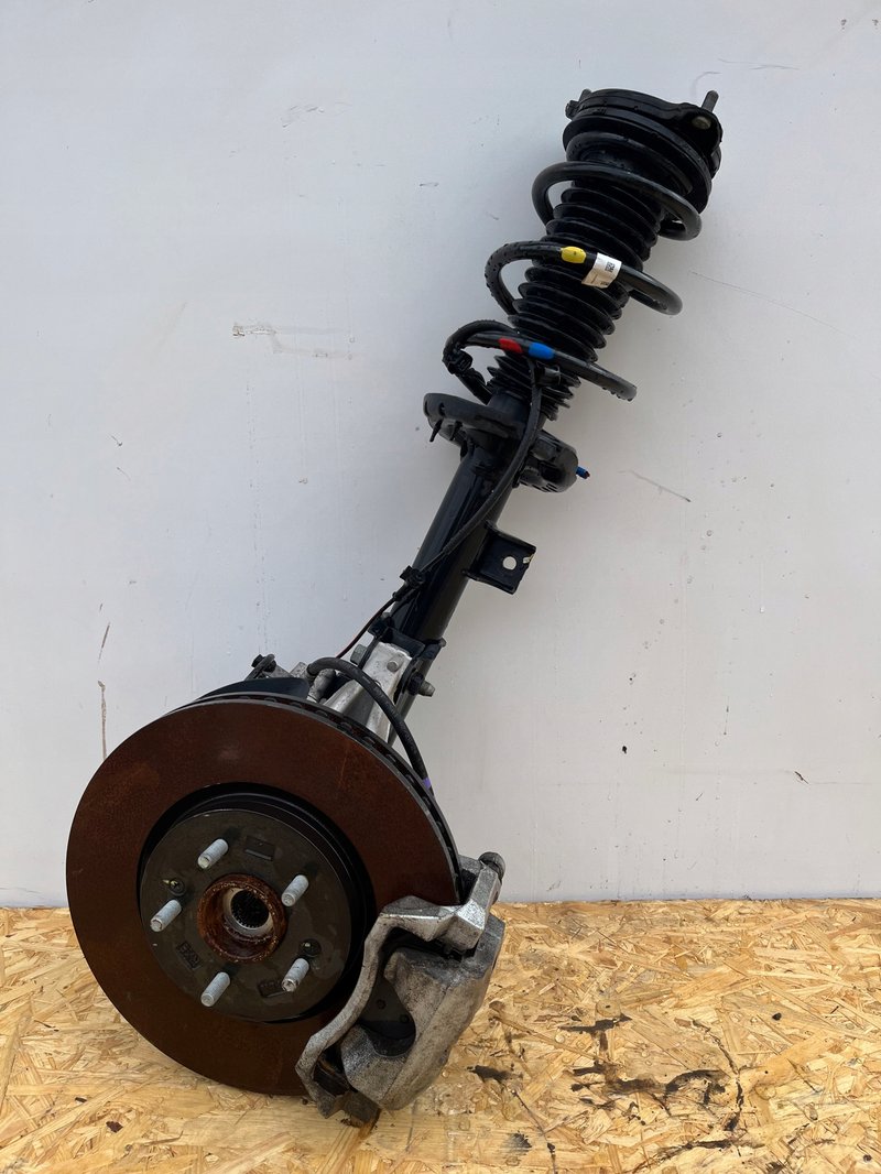 HYUNDAI TUCSON IV 1.6 Mcpherson Zwrotnica PRAWA przednia