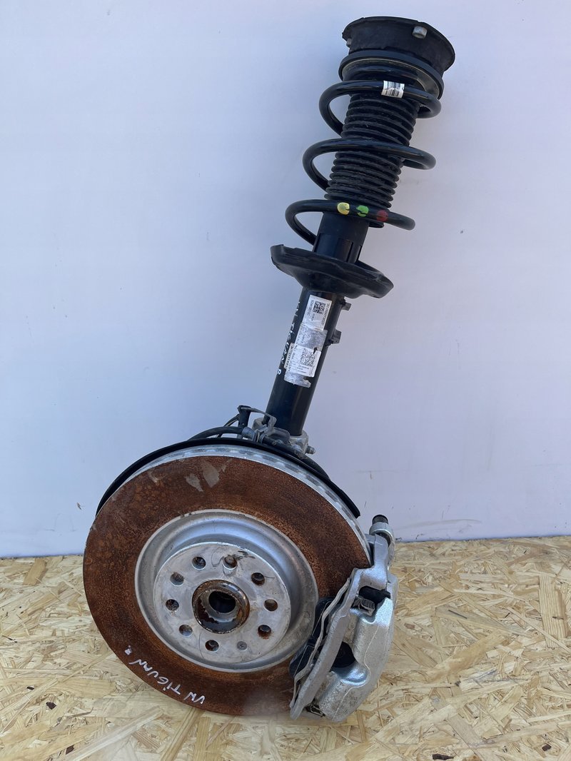 VW TIGUAN III ZWROTNICA MCPHERSON AMORTYZATOR LEWY 5QS412021QC