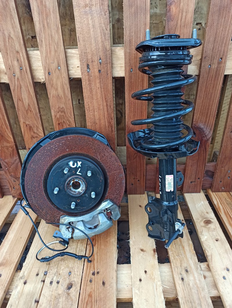 LEXUS UX NOGA PIASTA AMORTYZATOR LEWA STRONA